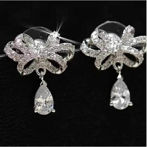 Celebration Earrings Big Bow And Pear Cut Crystal In Silver Polish-JewelryKorner-com